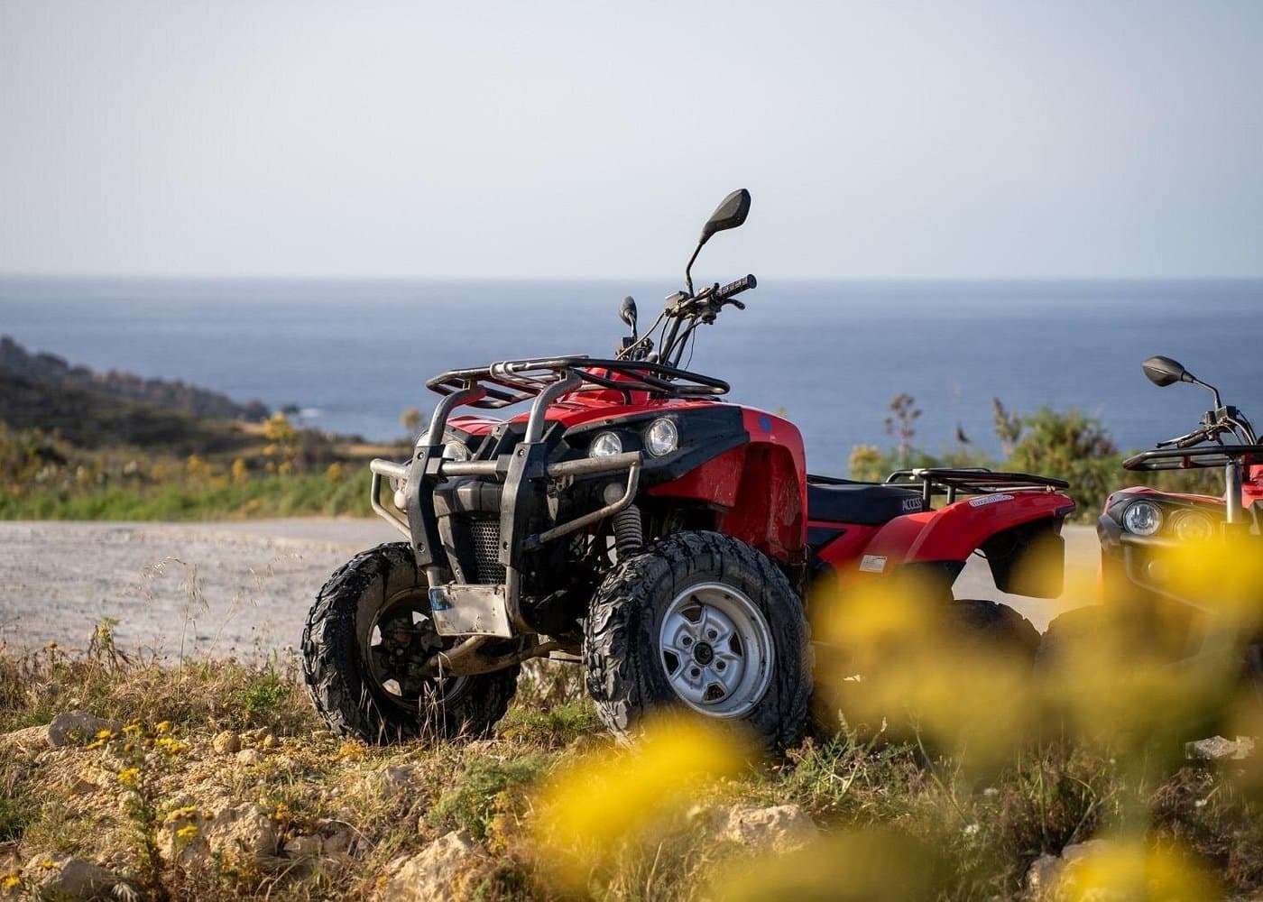 Quad bikes at a Gozo lookout during Pride’s island loop.
